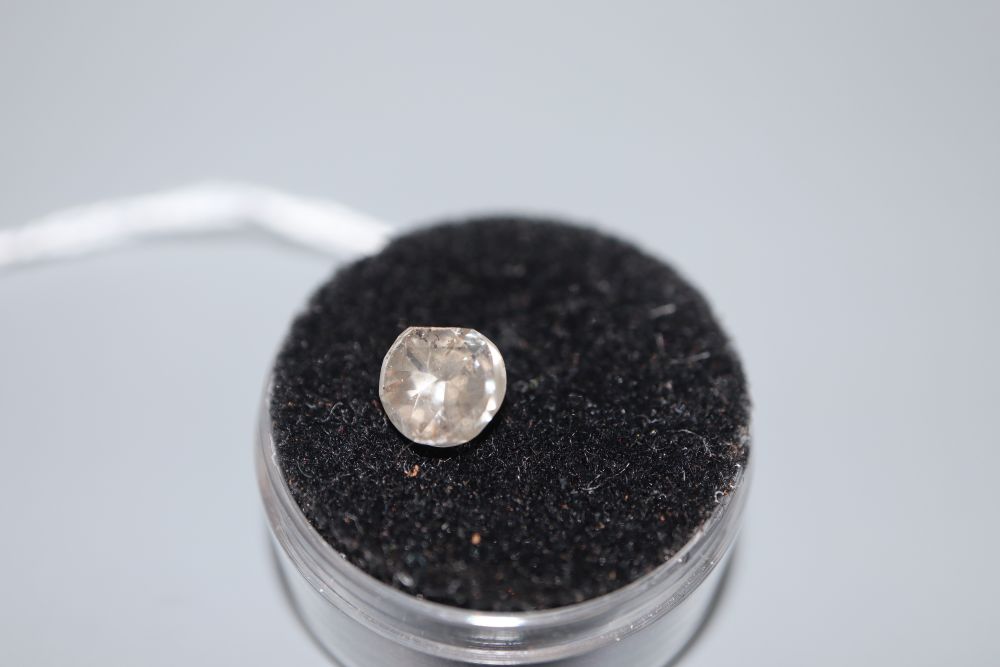 An unmounted flat? cut diamond, weighing approximately 1.52ct.